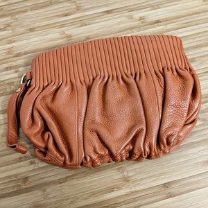 burnt orange leather Bodhi clutch